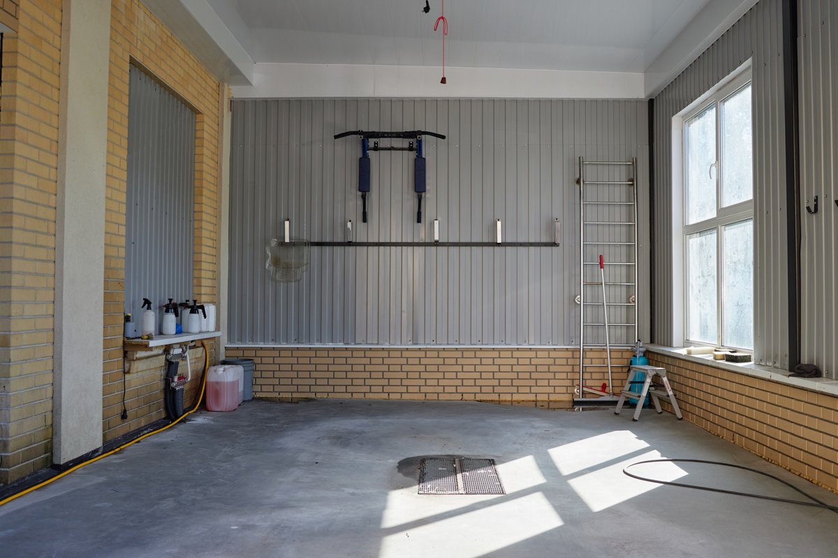 Priority-Junk-Removal-Stock-Photos-empty-car-service-garage-interior-featuring-equipm-2025-10-04-04-39-46-utc